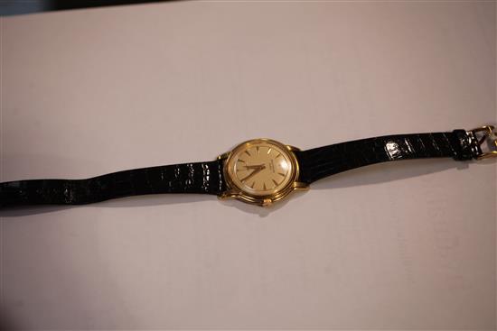 A gentlemans 1950s 18ct gold Patek Philippe Calatrava manual wind wristwatch,